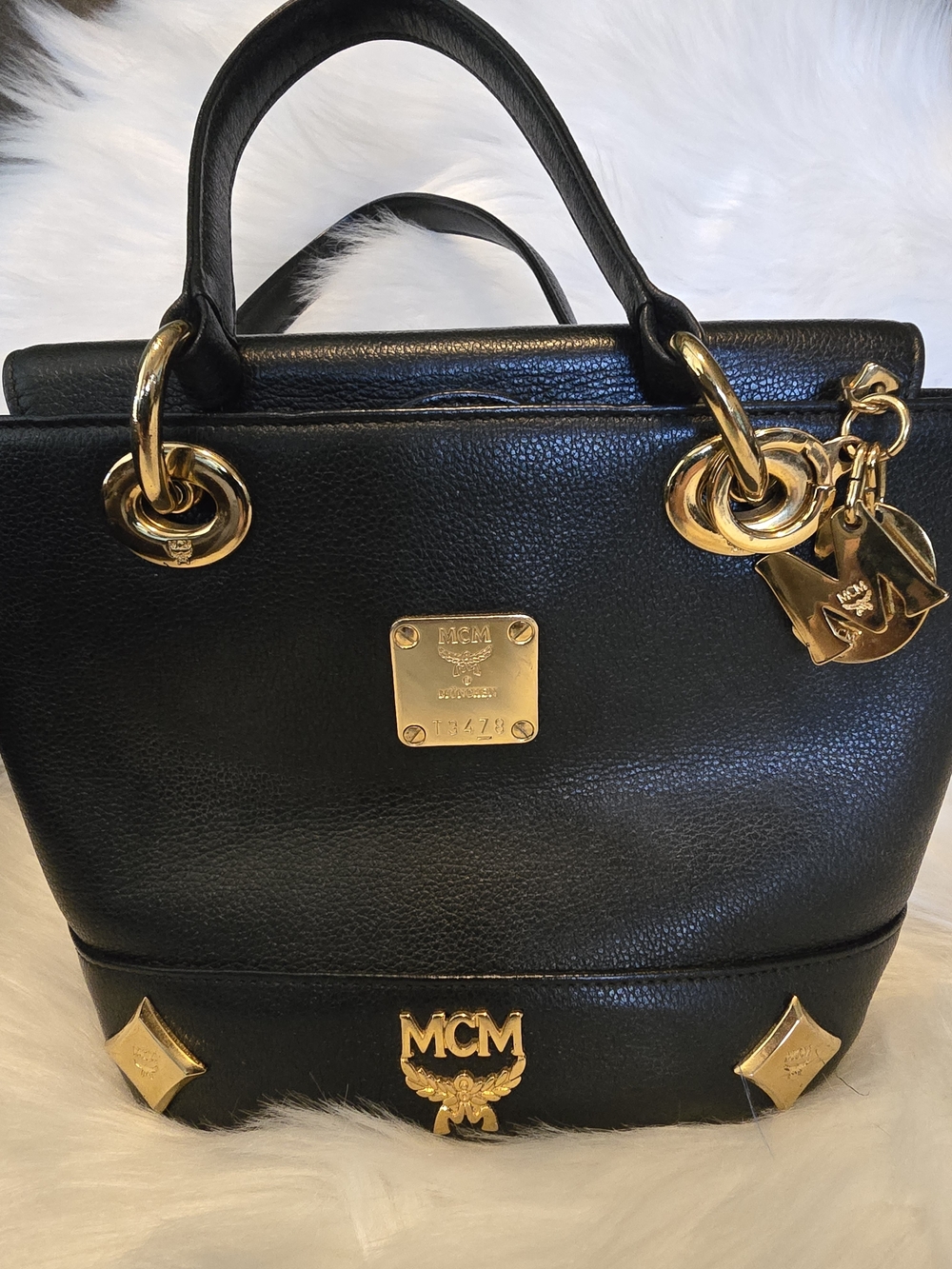 MCM Black Leather Tote with Gold Hardware and Logo Charm